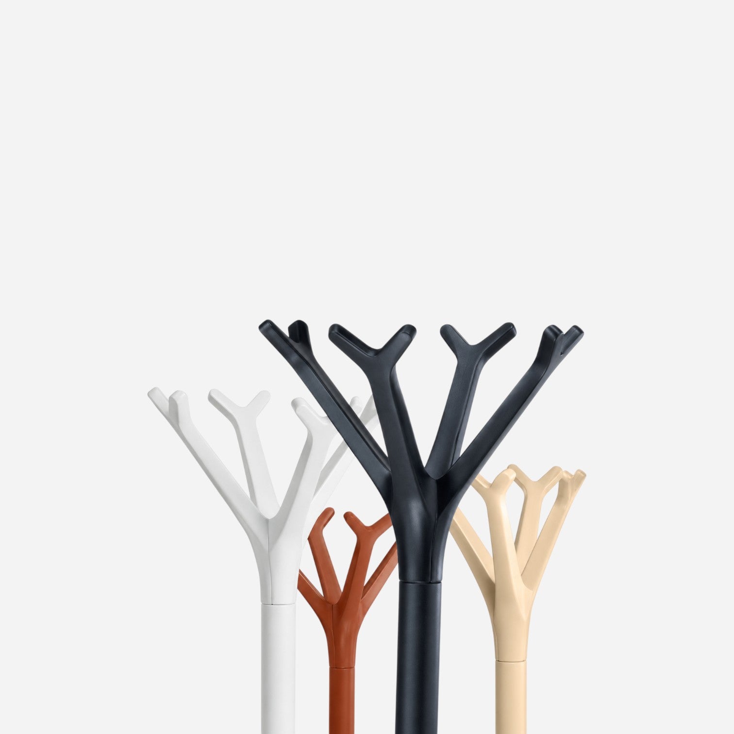 Addo Shop Battista coat stand in white, black, rust, and beige, with a unique tree-branch design.