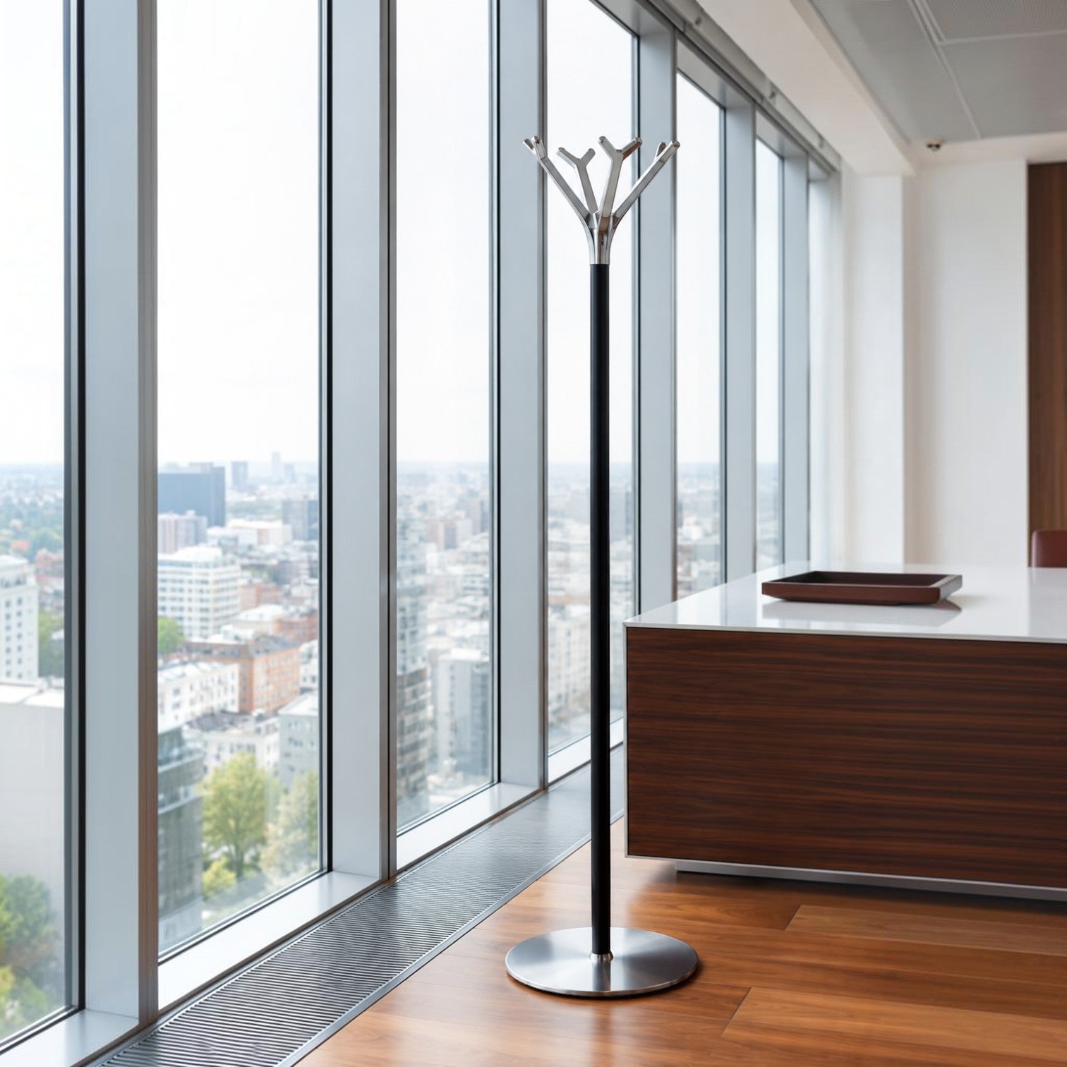 Addo Shop Battista Coat Stand with silver branch-like hooks and black pole on a silver base.
