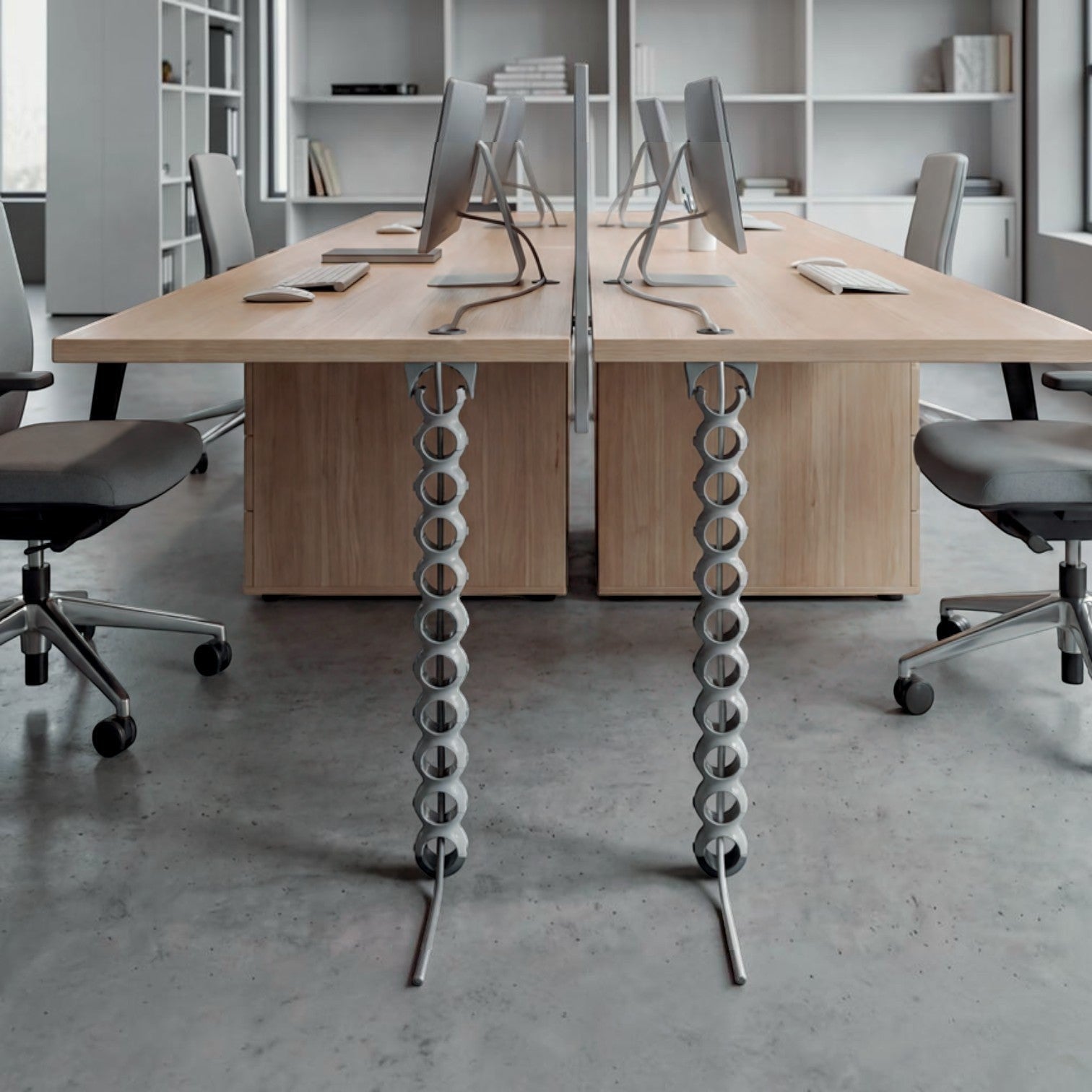 Addo Shop grey plastic BISS cable holder with 10 rings, attached under a wooden desk to manage wires.