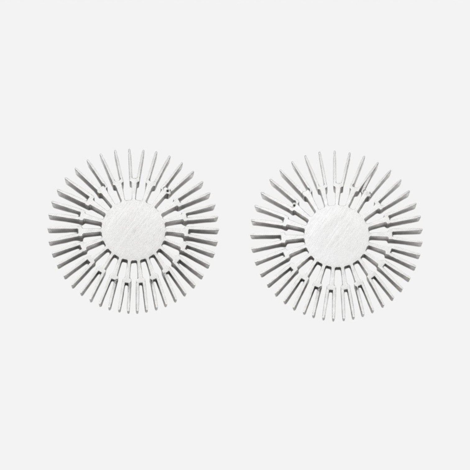 Addo Shop circular aluminum heatsink with radial fins for electronics cooling. Brushed metal finish.