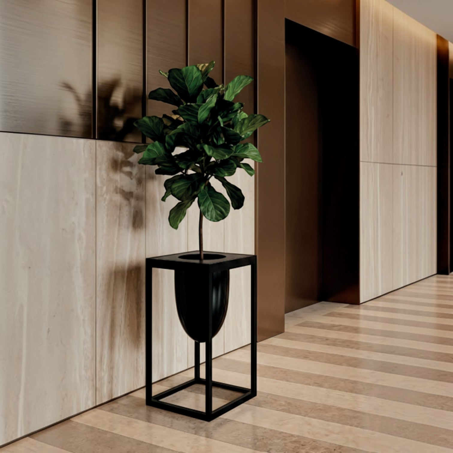 Addo Shop Florianopolis planter, 39 cm, black metal stand with a black oval planter holding a fiddle leaf fig plant.