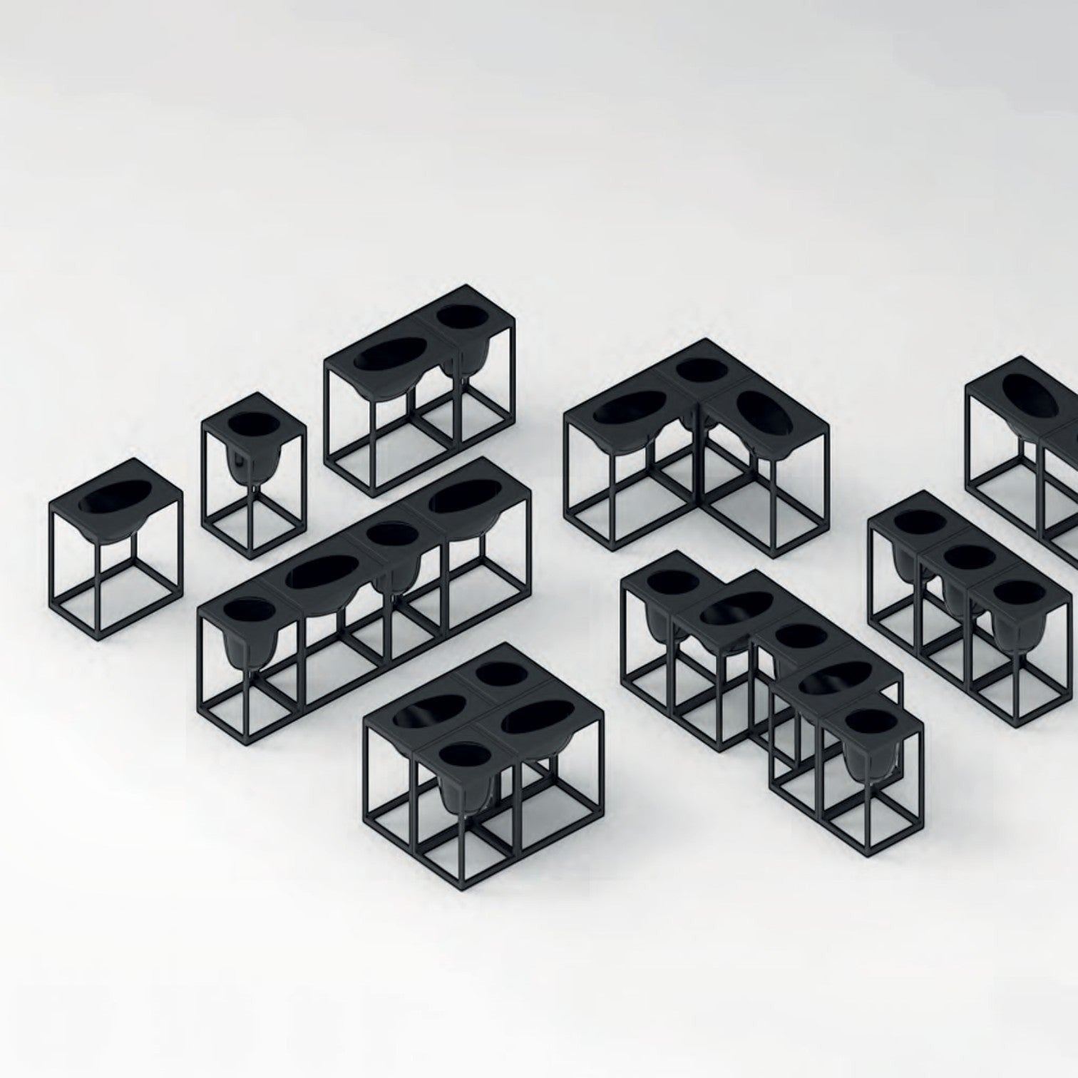 Addo Shop Florianopolis Planter 59, modular black metal planters with multiple oval openings.