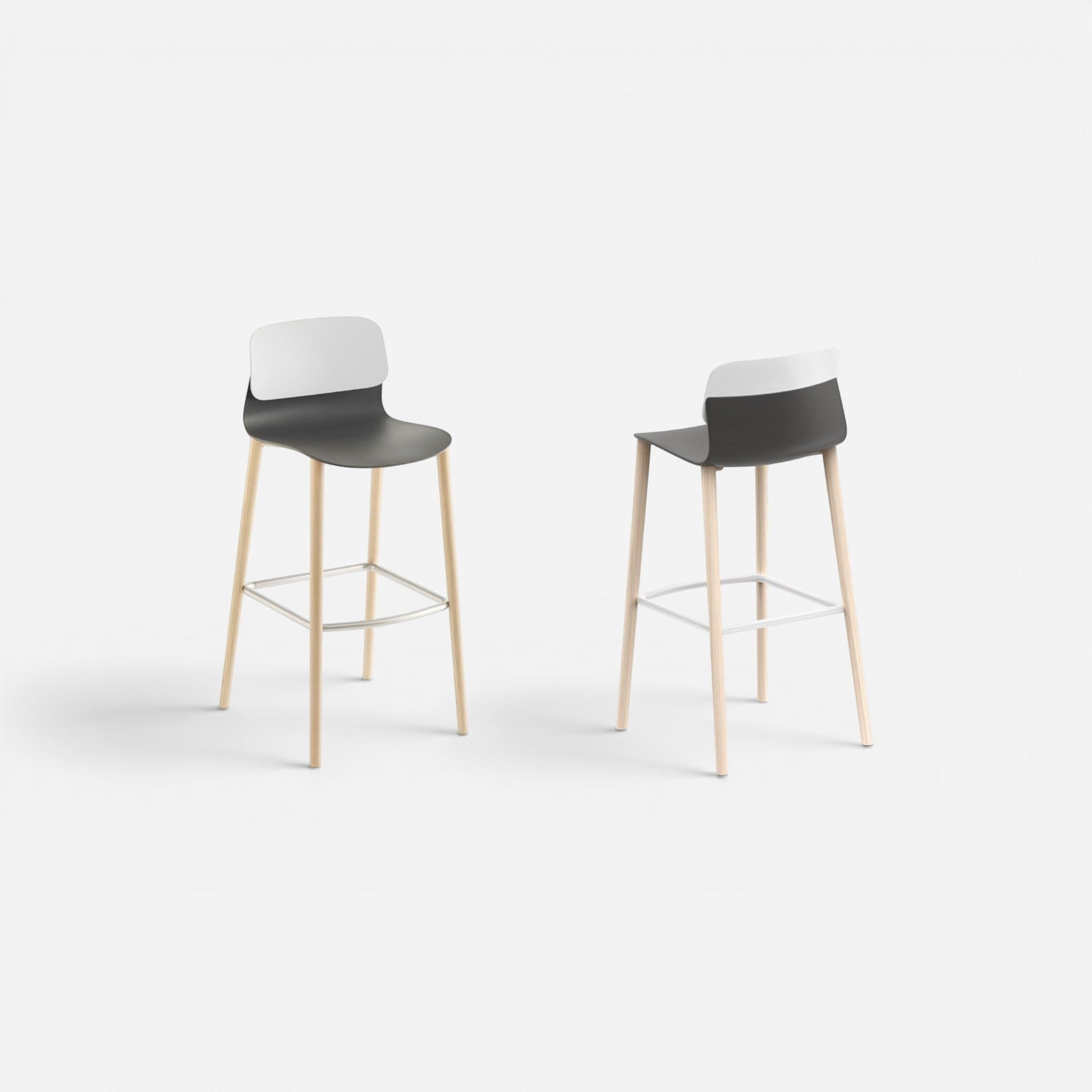 Addo Shop Greta bar stool with dark grey plastic seat and white backrest on light wood legs with metal footrest.