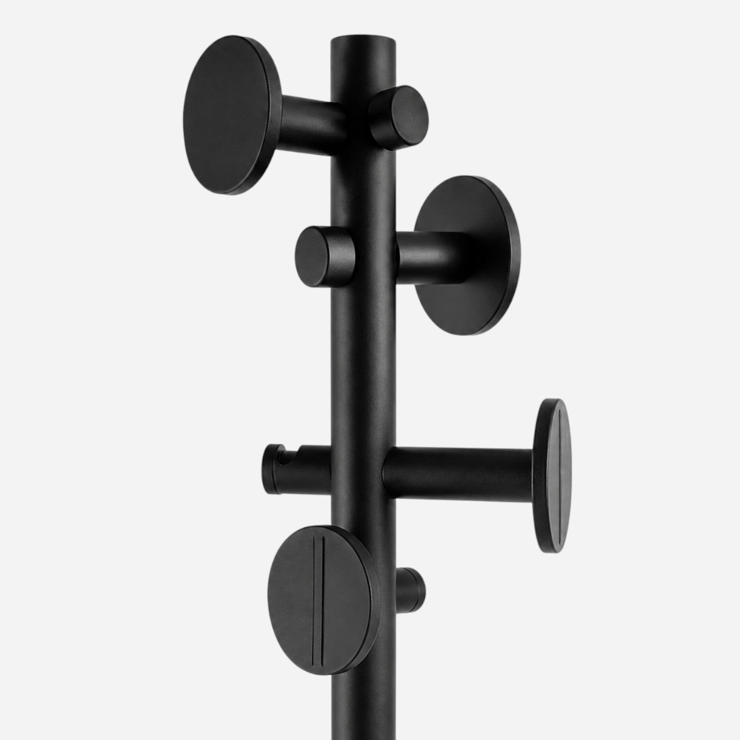 Addo Shop Luthea Coat Stand with multiple black metal hooks and circular accents.