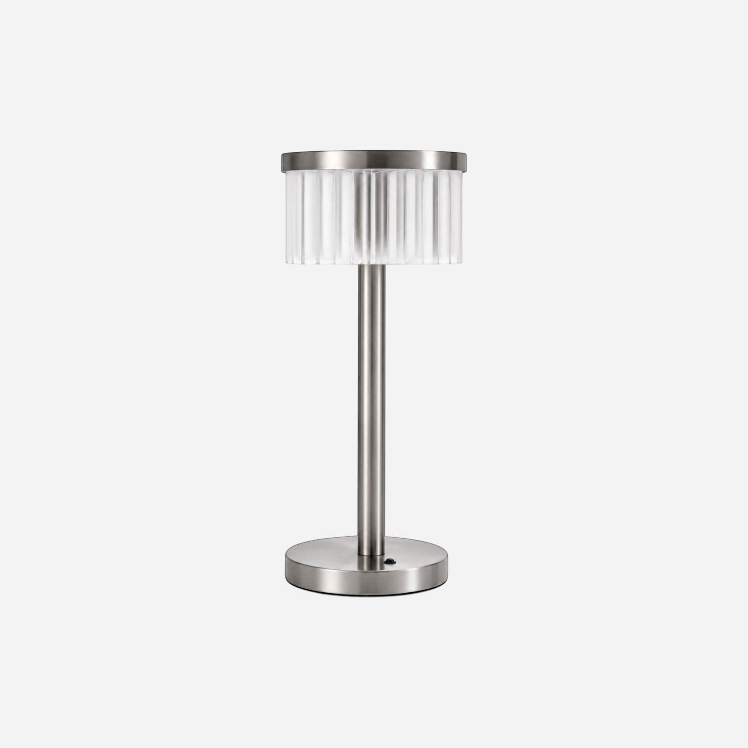 Addo Shop modern brushed nickel table lamp with fluted clear acrylic shade and circular base.