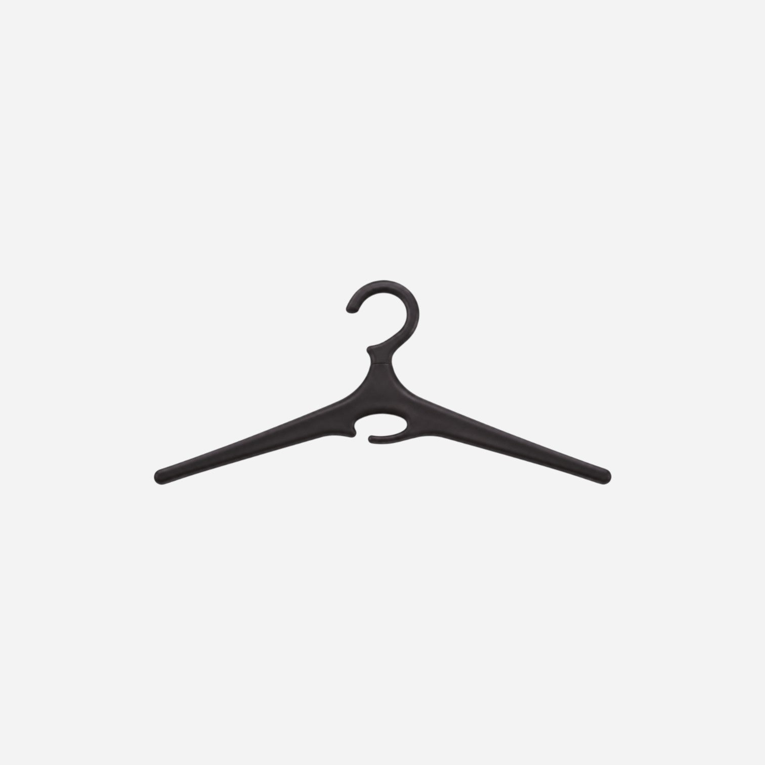 Addo Shop Ometto black plastic hanger with a unique curved design and integrated hook for coats and garments.