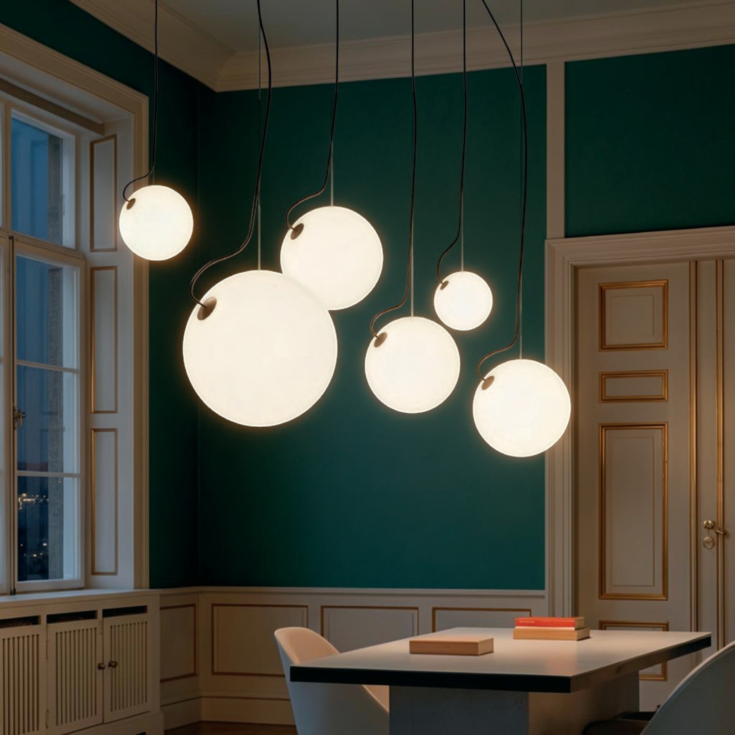 Addo Shop OPERA Pendant Light, a cluster of frosted glass globe pendant lights in varying sizes, casting a warm glow.