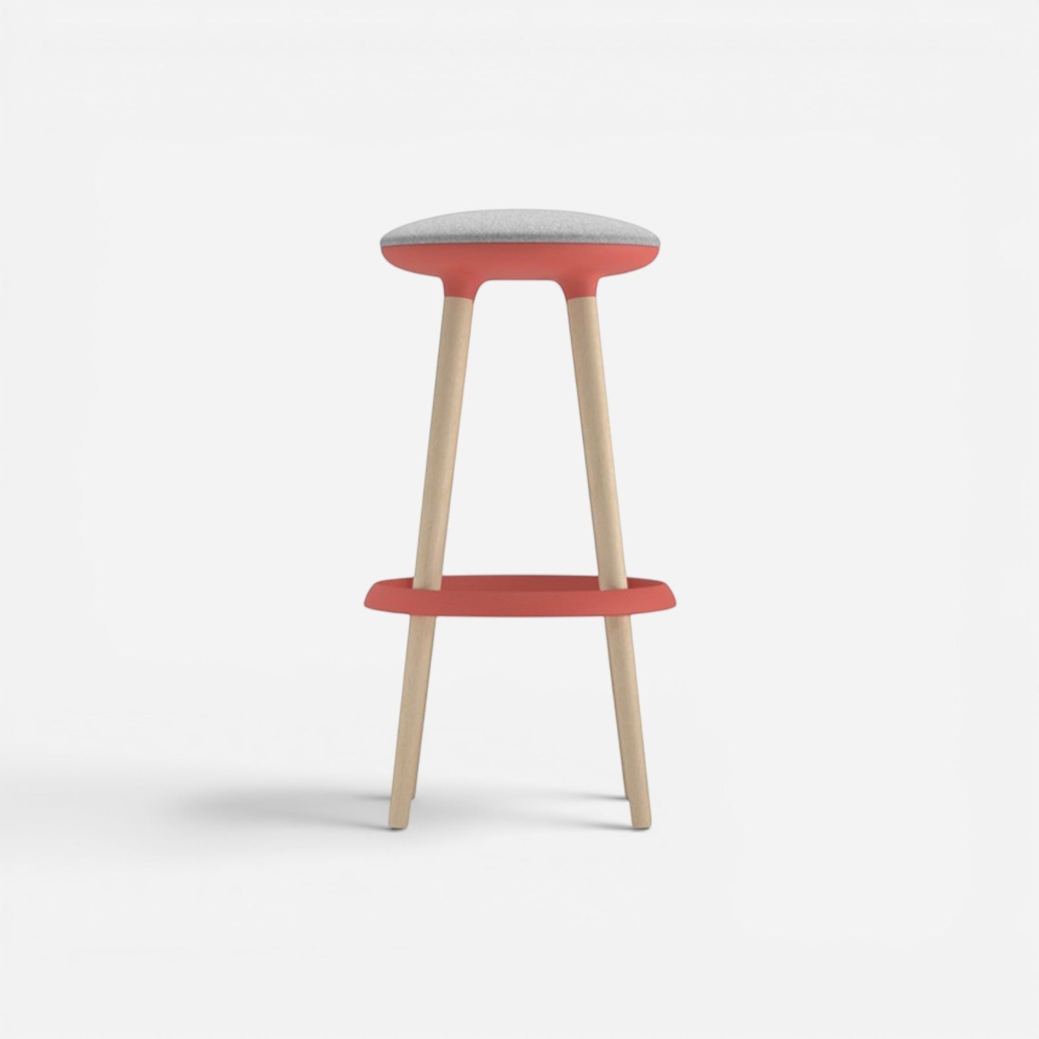 Addo Shop Pin high stool with coral base, light wood legs, and grey fabric seat.