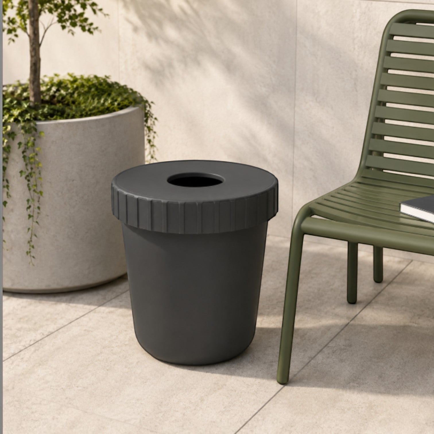 Addo Shop Raffles System dark grey waste bin with ridged lid and central opening, designed for outdoor use.
