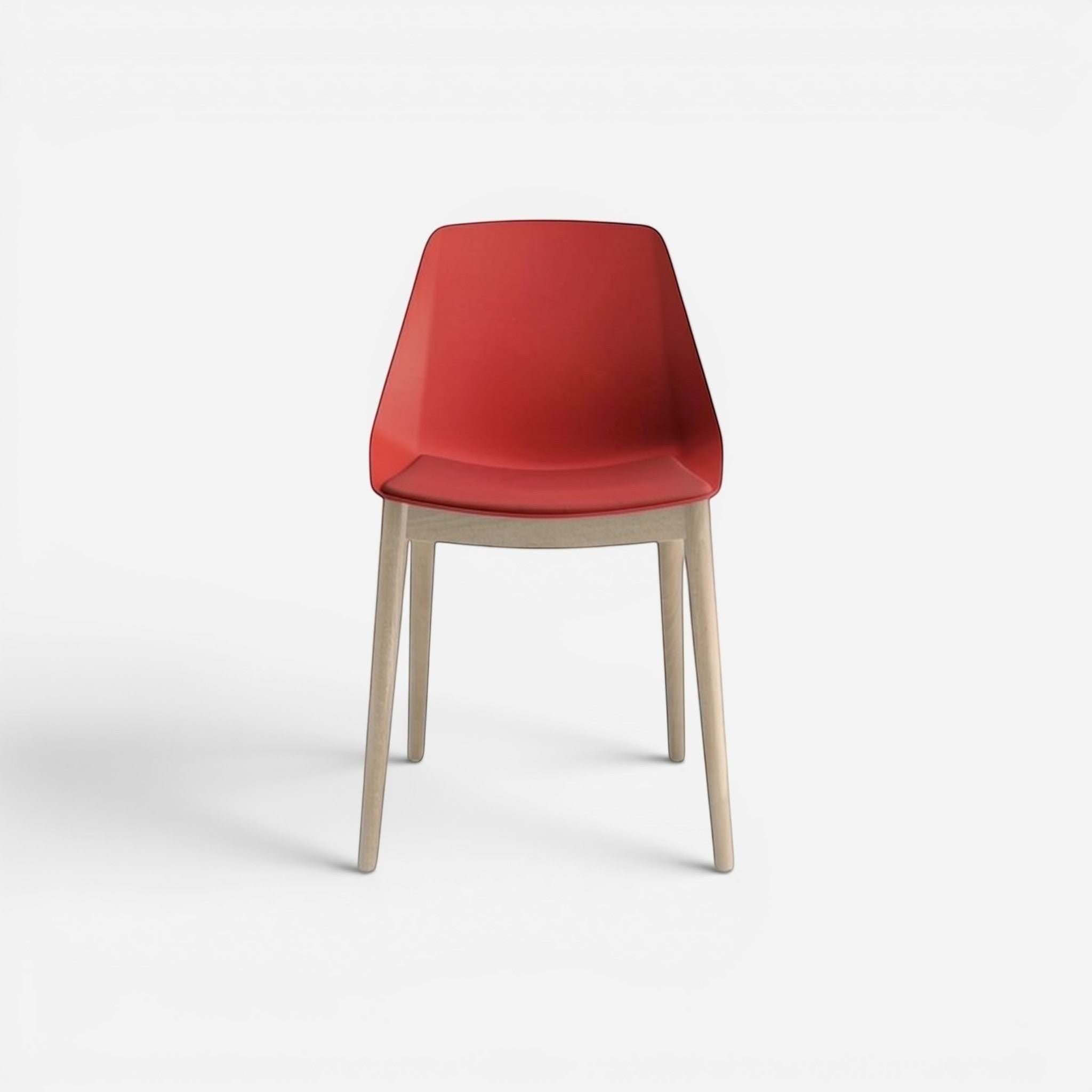 Addo Shop red molded plastic seat and back dining chair with natural wood legs.