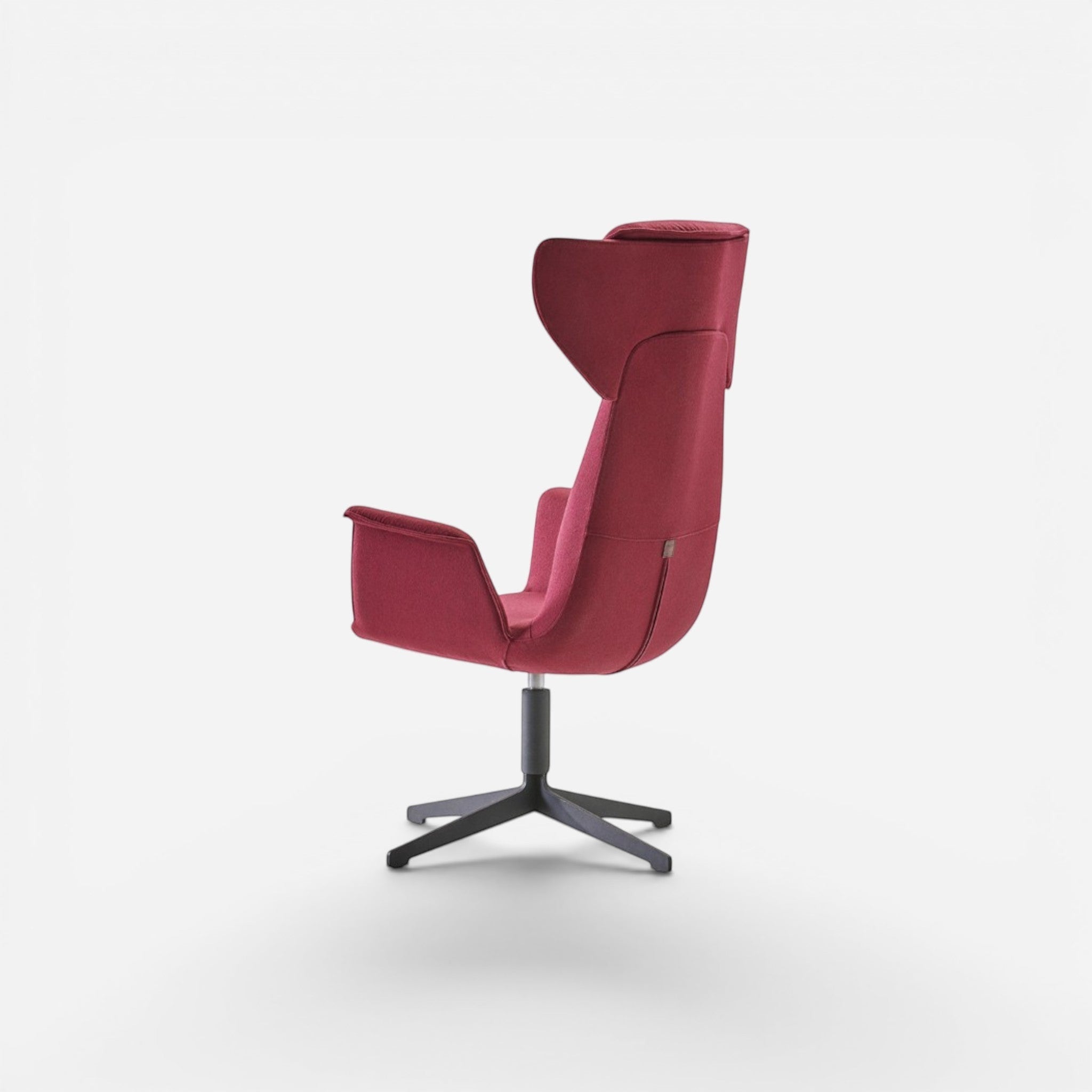 Addo Shop Spina 01 lounge chair in deep red fabric with a swivel base and chrome metal legs.