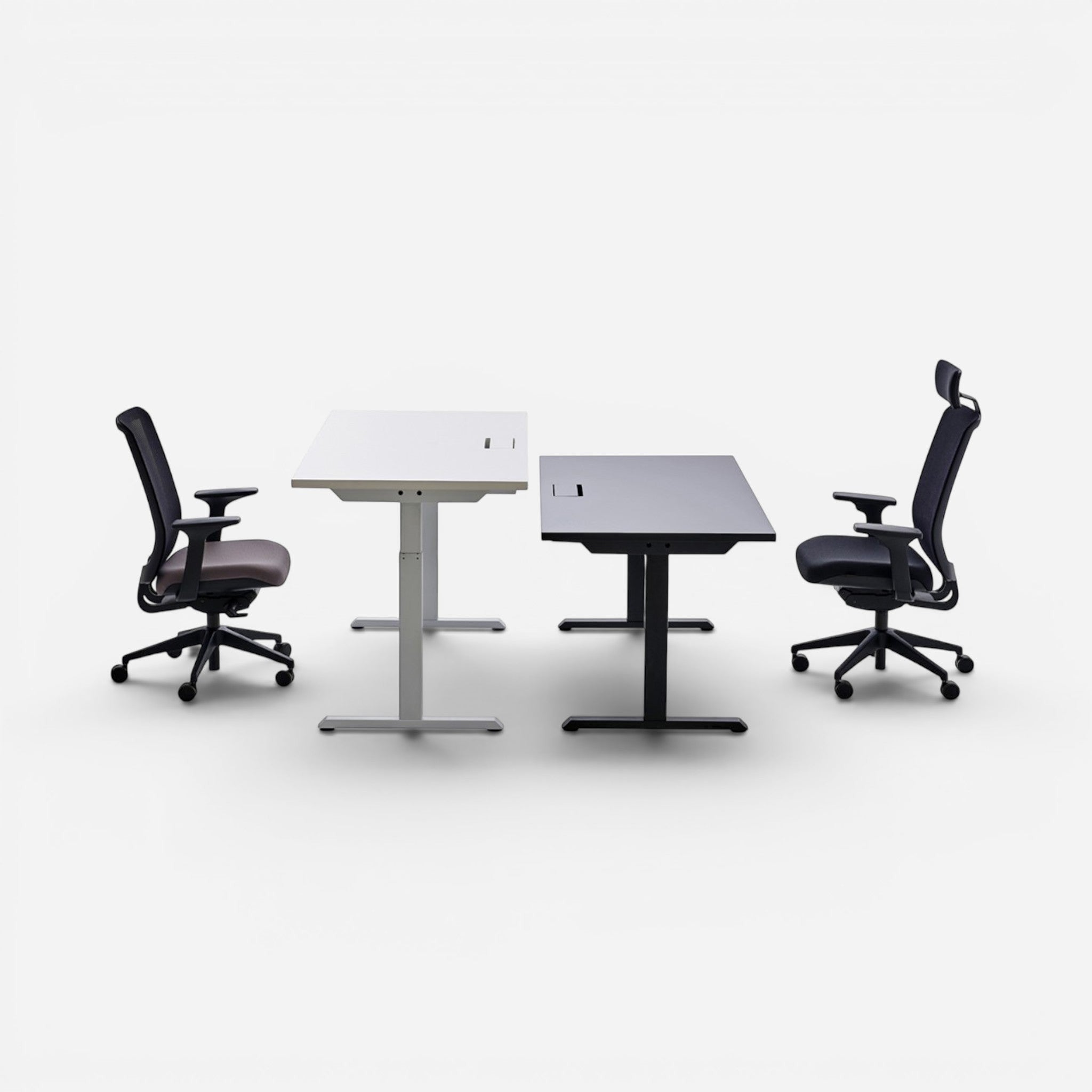 Addo Shop Up Down ergonomic sit-stand desk in white and grey laminate with adjustable height metal legs. Includes office chairs.