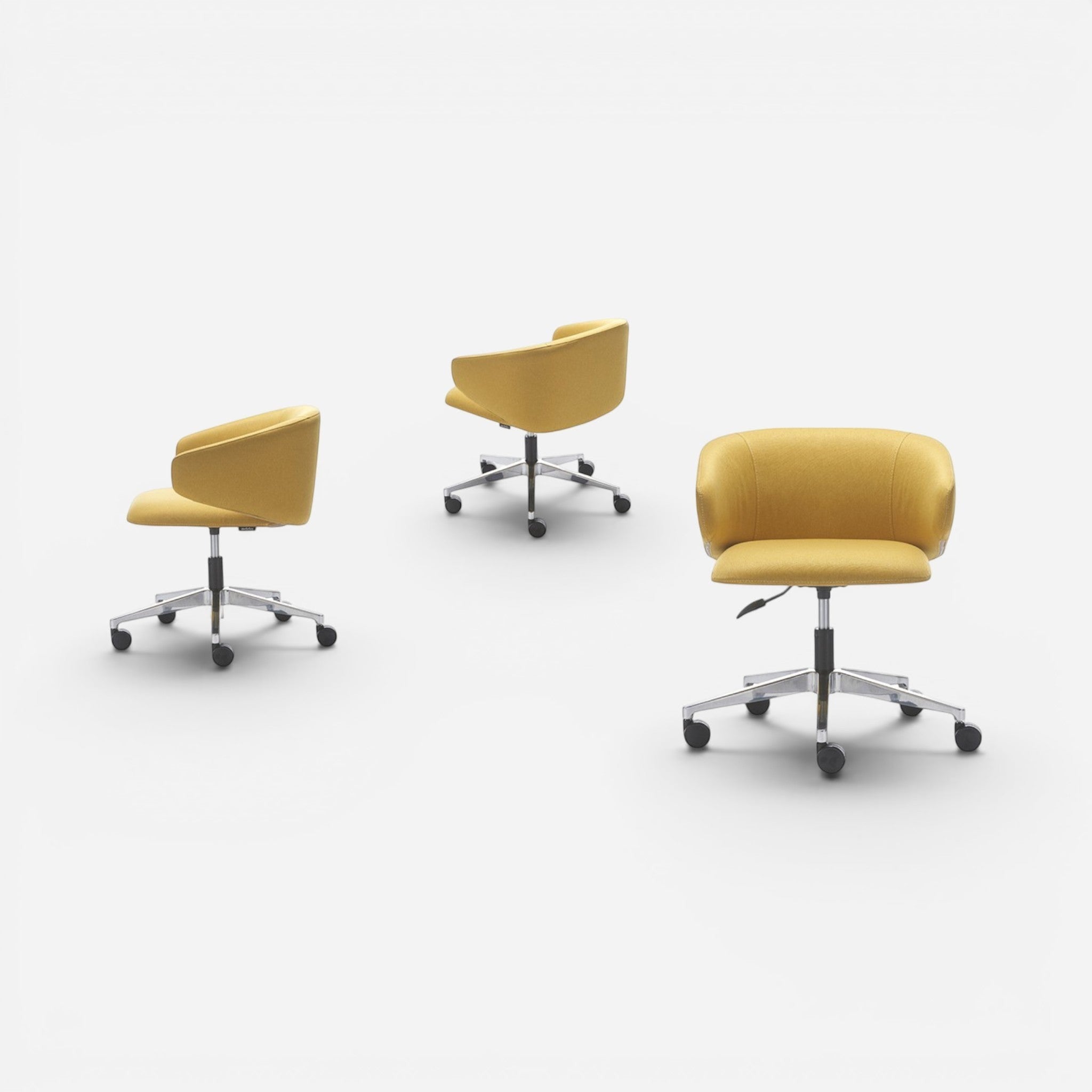 Addo Shop Wing Low yellow fabric office chair with aluminum base and height adjustment.